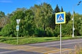 Pedestrian crossing with markings and signs on a country road Royalty Free Stock Photo