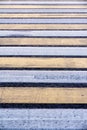 Pedestrian crossing. Road markings on asphalt. Striped blue and yellow background and texture Royalty Free Stock Photo