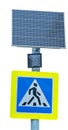 Pedestrian crossing road sign and solar-powered traffic light Royalty Free Stock Photo