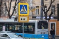 Pedestrian crossing sign for the blind on a busy Almaty street Royalty Free Stock Photo