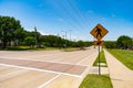 pedestrian crossing sign. road sign of pedestrian crossing. caution yellow roadsign. traffic sign on the road. attention