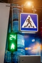 Pedestrian crossing street sign and traffic light for pedestrians