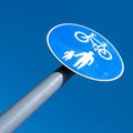 Pedestrian and Cyclist Path Road sign Against A Clear Blue Sky