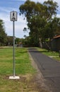 Pedestrian and cyclist shared path sign at park Royalty Free Stock Photo