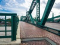 The pedestrian footpath on Memorial Bridge is a bascule bridge over the Chao Phraya River in Bangkok. Royalty Free Stock Photo