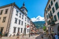 Pedestrian Grand-Pont street and Sion city hall building with clock tower and people in Sion old town Valais Switzerland Royalty Free Stock Photo