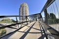 Pedestrian overpass with metal railing and roof