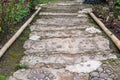 A pedestrian path made of stones and cement of Ã Â¸Â´bear feet shape for walking the garden