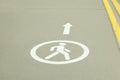 Pedestrian path sign on the asphalt road Royalty Free Stock Photo