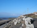 The pedestrian pathway along the south promenade in Blackpool at the landscaped area known as the cliffs with the beach and sea in Royalty Free Stock Photo