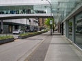 Pedestrian pavement, bike track, and car road in downtown of Vancouver, Canada.