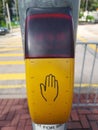 Please Wait signal button in transportation system of Hong Kong