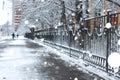 Pedestrian sidewalk the fence winter Royalty Free Stock Photo