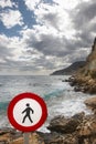 Pedestrian signal in a mediterranean coastine landscape. Alicant
