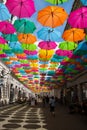 Pedestrian street ( Alba Iulia street) decorated with colored umbrellas in Timisoara, Romania Royalty Free Stock Photo