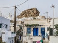 Pedestrian street of Chora village built around a large rock on Amorgos island, Aegean Sea, Cyclades, Greece