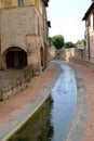 Pedestrian street of the portico dellee Conce in Foligno. Home to ancient tanneries along the canal of the mills Royalty Free Stock Photo