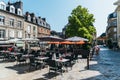 Pedestrian street with restaurants in Fougeres, Brittany