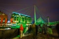 Pedestrian traffic and light display at the Inner Harbor in Baltimore, Maryland