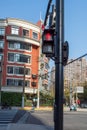 Pedestrian traffic lights are on red lights prohibiting traffic