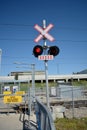 Pedestrian transit train crossing with warning lights Royalty Free Stock Photo