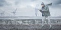 Man with an umbrella is facing a strong wind and rain Royalty Free Stock Photo