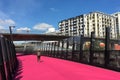 Pedestrian walks on Nelson Street Cycleway in Auckland New Zealand