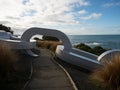 Pedestrian walkway with giant oversized silver anchor chain art sculpture at Stirling Point Bluff Southland New Zealand Royalty Free Stock Photo