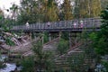 Pedestrian wooden bridge over the river Olonka, republic Karelia