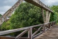 Pedestrian wooden bridge and stone bridge over the PÃªra stream, PedrogÃ£o Grande PORTUGAL Royalty Free Stock Photo