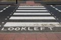 Pedestrian zebra crossing marked look left Royalty Free Stock Photo