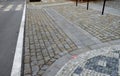 In the pedestrian zone, the entrance is regulated by black decorative steel posts. the post can be tilted to the ground for passer