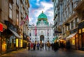 The pedestrian zone Herrengasse with a view towards imperial Hofburg palace in Vienna, Austria. Kohlmarkt shopping street in Royalty Free Stock Photo