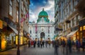 The pedestrian zone Herrengasse with a view towards imperial Hofburg palace in Vienna, Austria. Royalty Free Stock Photo