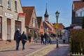 Pedestrian zone in Hooksiel, Germany on a sunny spring day