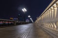 Pedestrian zone on the stone bridge. Stone tiles, railings made of concrete marble baluster.