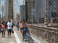 Pedestrians and bicyclists crossing Brooklyn Bridge Royalty Free Stock Photo