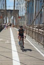 Pedestrians and bicyclists crossing Brooklyn Bridge Royalty Free Stock Photo