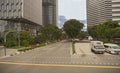 Pedestrians and cars are moving along the streets of the city Royalty Free Stock Photo