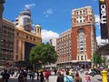 Pedestrians in a City Plaza, Madrid, Spain