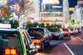 Pedestrians cross at Shibuya Crossing. It is one of the world's most famous scramble crosswalks. Royalty Free Stock Photo