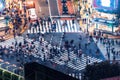 Pedestrians cross the Shibuya Scramble crosswalk, in Tokyo, Japan Royalty Free Stock Photo