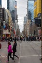 Pedestrians crossing the road in the center of Melbourne, Victoria, Australia