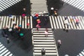 Pedestrians crossing with umbrellas, Sukiyabashi, Crossing, Ginza, Tokyo Royalty Free Stock Photo