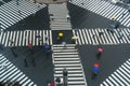 Pedestrians crossing with umbrellas, Sukiyabashi, Ginza, Tokyo