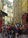 Crowded Streets of Paris Alley Filled with People Royalty Free Stock Photo