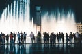 Pedestrians at Dubai Fountain at night Dubai - UAE