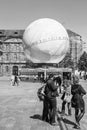 Pedestrians in front of globe pavillion France Candidacy for World Fair 2025