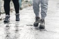 Pedestrians glide along the icy sidewalk. Winter ice on footpaths Royalty Free Stock Photo