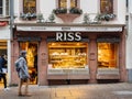 Pedestrians people walking in front of Ross Patissier Chocolatier bakery in Royalty Free Stock Photo